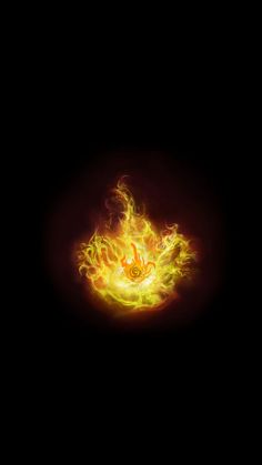 a black background with yellow and red fire in the center, on top of a cell phone