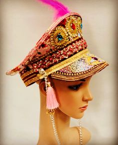 This is a hand crafted individual captain hat oozing with character and detail.  It has pearls, gems, trim , feather and chain to name a few. This is a size 59cm fits most heads comfortably. Any creases and markings are deliberate and not a defect. This is a must have accessory to set off any outfit. Every hat is unique one off and made with love. Thank you for looking Burningman Festival, Bride Hat, Military Hat, Costume Hats, Burning Man, Gothic Fashion, Costume Accessories, Festival Captain Hat, Mardi Gras