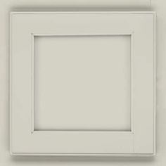 an empty white square frame hanging on the wall with no one around it or in front of it