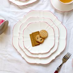 a plate with crackers and cookies on it