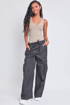 Every day is a new chance to wear our Women’s Relaxed Fit Cargo Pants. This high-waisted nylon pant features a relaxed fit for both style and comfort, ensuring you’ll look good and feel good throughout the day. Includes classic front pockets, three cargo pockets with button closures, and faux back pockets for maintaining a smoothing effect on your bum. These trendy pants are detailed with metal d-rings on the front belt loops and a drawstring waist so you can adjust the fit to your liking. Style Fit Cargo Pants, Ymi Jeans, Trendy Pants, Nylon Pants, Women Lifestyle, Lounge Shorts, Linen Women, Cargo Pants, Drawstring Waist