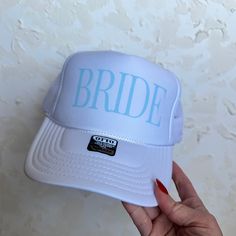 These trucker hats are THE stylish accessory for the any bride or wife. Made of high-quality materials, this hat features a classic trucker design with a curved bill and mesh back for breathability. The front of the hat features trendy designs in bold letters, making it a perfect gift for your BFF or yourself! Wear it on a sunny day to keep the sun out of your eyes or as a trendy addition to any outfit. ** PLEASE READ DESCRIPTION ** All trucker hat sizes are UNISEX - OSFA Adult ✅ PRODUCTION > Most products are printed to order, so please allow 3-5 days for production plus shipping time. ⏰ *These times may be extended during busy holiday months - check shop Home Page for updates. If you need this item expedited, please send me a message.  > PRINTING : We use a direct transfer printing metho Hats Trendy, Wife To Be, Bold Letters, Trendy Hat, Trendy Designs, Transfer Printing, Bride To Be, Sunny Day, Shop Home