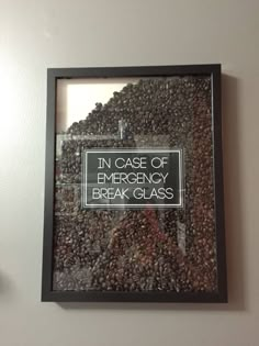 there is a sign on the wall that says in case of emergency break glass,