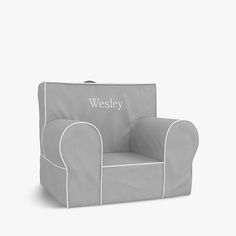 a gray and white chair with the word weeley on it