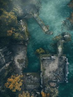 an aerial view of a lake and dock