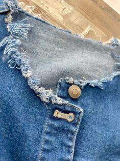 an old pair of jeans that have been torn down