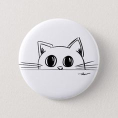 a button with a cat's face drawn on it