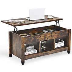 a wooden table with an open drawer underneath it and a laptop on top of it