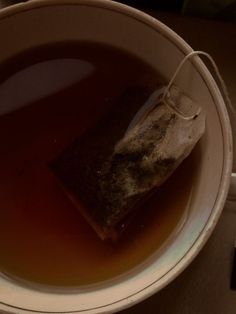 a cup of tea with some sort of substance in it