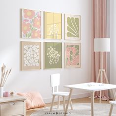 a living room filled with furniture and paintings on the wall above a table in front of a window