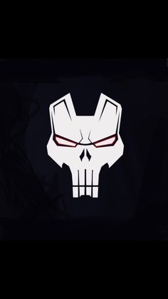 a white skull with red eyes in the dark