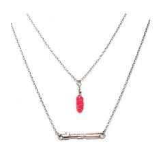 two necklaces with red glass beads hanging from the ends of chain, on white background