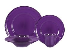 purple dinnerware set with matching cups and saucers