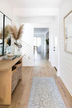 the hallway is clean and ready for us to use as an entrance way in this home