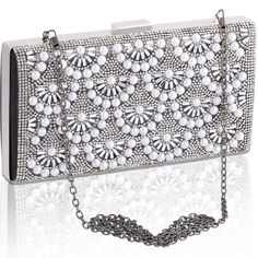 PRICES MAY VARY. CLASSIC EVENING BAG: Upgrade Bling Rhinestone Metal Hardshell & Made of high quality satin fabric. This evening clutch purses covered sparkling glitter that brings glamour to your formal dress; Durable hardware ( long & short chain).3-in-1 STYLE - Evening bag/Handbag/Shoulder chain bag,can be clutched by hands or hung on shoulders with the detachable chain. FEATURES OF THE DESIGN: The opening type is buckle, easy to open and close; has lining and One internal pocket with High qu Trendy White Evening Bag For Parties, Elegant Summer Party Shoulder Bag, Rectangular Evening Bag For Summer Parties, Elegant Summer Party Bags, Silver Formal Bag For Summer, Silver Party Bag For Summer, Elegant Holiday Bags, Purse Covers, Pearl Clutch