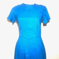 "Vintage 1950's Lanz Press - Lanz Originals Cobalt Blue Sheath Dress > Size 13 > Button up back > Short Sleeve CONDITION: In amazing condition. No noted Flaws MEASUREMENTS: Bust - 30\" Waist - 14\" Length - 41\" Underarm to Underarm - 15\" ** Note - All of the inventory in the store are used Vintage items, outside of the homemade beadwork. Please check out the pictures provided and read the description accordingly, as most of the items have some amount of wear from age. I will do my abs Blue A-line Vintage Fashion Dress, Formal Fitted Vintage Dress, Fitted Vintage Dress In Solid Color, Fitted Vintage Short Sleeve Dress For Work, Fitted Vintage Dress With Short Sleeves For Work, Fitted Short Sleeve Vintage Dress For Work, Solid Color Fitted Knee-length Vintage Dress, Vintage Blue A-line Dress, Vintage Blue Vintage Style Formal Dress