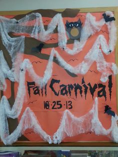 a bulletin board with halloween decorations on it