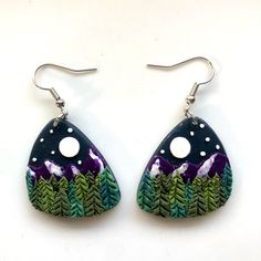 I Handcrafted These Earrings Out Of Polymer Clay And They Are Brand New And Fresh Out Of The Oven. Lightweight, Comfortable Dangle Earrings With Hooks. A Dark Navy Blue Abstract Rounded Triangle Depicts The Light Sky With White Moon And Stars. A Purple Mountain Range Spans Across The Background Complete With Snow, And A Forest With Pine Trees In Various Shades Of Green Spreads Below. There Are Some Minor Imperfections That Add Character To The Handmade Design And Make Them Truly One Of A Kind. G Forest Earrings, White Moon, Knot Studs, Pink Feathers, Boho Green, Button Earrings, Swarovski Crystal Earrings, Zirconia Earrings, Silver Moon