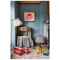 a living room filled with furniture and toys