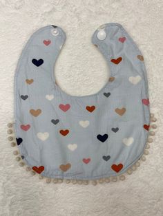 Handmade baby bib 100% cotton. Machine wash cold water and air dry  Do not leave your baby unsupervised while wearing bib bib dimension: APPROX 7inch*8inch approximate fit for new born to 18 months Playful Machine Washable Bib As Gift, Cute Machine Washable Bib As Gift, Playful Bib For Playtime, Cute Cotton Bib As Gift, Scrap Fabric Baby Bibs, Playful Cotton Bib As A Gift, Washable Bib For Playtime, Playful Washable Bib For Playtime, White Washable Cotton Bib