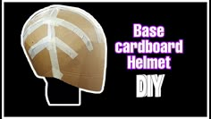 a cardboard helmet with tape on it and the words base cardboard helmet diy