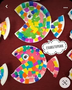 colorful paper plates with fish made out of them