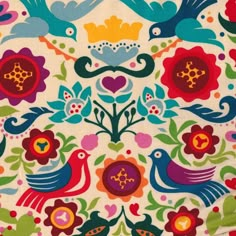 a colorful pattern with birds and flowers on it