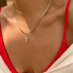 "DETAILS: * Single chain (of choice) with charm * 18k Gold Filled Chain * Singapore Chain Length: 16\" + 1\" extender * Cuban Chain Length: 18\" + 1\" extender * Cross Charm Size: 11mm x 15mm (Extenders are to make the necklace adjustable to wear at different lengths) ►WHY GOLD FILLED? If you have been on the search for everyday gold jewelry that doesn't tarnish but affordable, gold filled is the best choice! Gold filled jewelry is second best after solid gold jewelry. *Our Gold filled jewelry has an outer layer of 14k or 18k gold that is pressure bonded to a base metal of jewelers brass or sterling silver. *This type of jewelry is made for everyday use of stacking or layering different pieces. * Our gold filled jewelry can withstand normal body sweat, body oils, and is typically water res Rhinestone Cross Pendant Necklace As Gift, Rhinestone Cross Pendant Necklace, Everyday Jewelry Gold, Layered Cross Necklace, Cross Necklace Gold, Layering Jewelry, Zirconia Necklace, School Jewelry, Cubic Zirconia Necklace