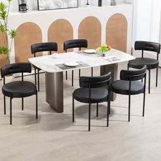 Modern Black PU Leather Dining Chairs: Elevate your dining experience with these contemporary chairs, offering a unique touch to your mealtime moments. Hokku Designs Upholstery Color: Black | Hokku Designs PU Leather Side Chair 30.5 H x 17.7 W x 19.7 D in gray / Faux Leather / Upholstered / Metal in Black | 30.5" H X 17.7" W X 19.7" D | Wayfair Leather Side Chair, Mid Century Modern Kitchen, Contemporary Chairs, Leather Dining Chairs, Upholstered Side Chair, Kitchen Chairs, Dining Chair Set, Living Room Kitchen, Upholstered Chairs