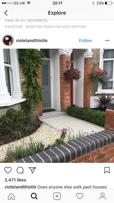 an image of a house with flowers and plants in the front yard on instagram