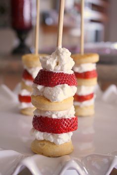 small desserts with strawberries and marshmallows on sticks