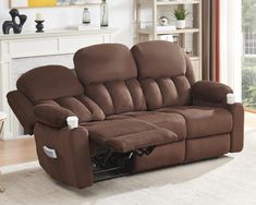 a living room with a brown reclining couch