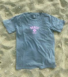 Looking for an awesome way to show where you've traveled or loved? This trendy Maui comfort colors t shirt is perfect! Featuring a white distressed Maui graphic on a super soft gray comfort colors tee, this Brandy Melville inspired design is perfect to finish off your trendy, oversized look! This T Shirt is super cute and great for instagram photos! Makes a great gift for a friend, or for yourself! Please note: This item is PRINTED, not embroidered. Printed on a soft, 100% cotton comfort colors Gray Short Sleeve Beach Top, Gray Short Sleeve Top For Vacation, Gray Screen Print T-shirt For Summer, Summer Gray Tops With Front Print, Gray Summer Tops With Front Print, Gray Tops With Front Print For Summer, Summer Gray Shirt With Screen Print, Gray Summer Shirt With Screen Print, Preppy Sweatshirts