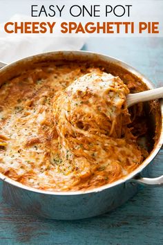 an easy one pot cheesy spaghetti pie is ready to be eaten in the oven