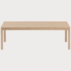 the table is made out of wood and has a rectangular shape, with no legs