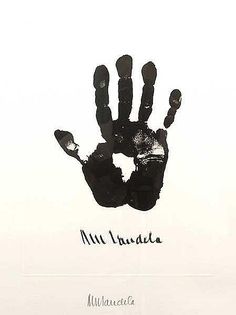 a black and white photo of a hand print with the words, mitt inside