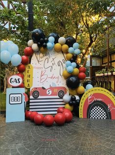 a birthday party with balloons and decorations