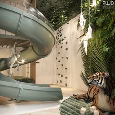 a tiger laying on top of a rug next to a slide in a room filled with plants