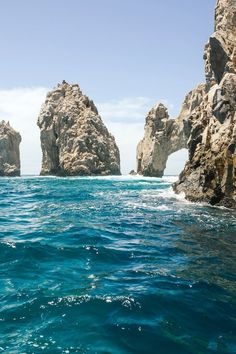 the rocks are sticking out of the water