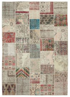 a patchwork rug with many different colors and patterns