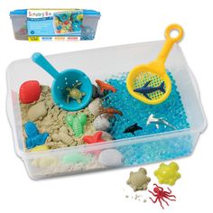 a plastic container filled with sand and toys