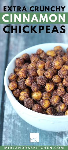 a white bowl filled with cinnamon chickpeas on top of a wooden table next to a