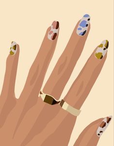 a woman's hand with two rings on it, and one ring is gold