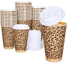 leopard print cups and plates with lids are shown in front of a white background,