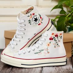 White Wedding Converse Shoes, Bridal Flowers Embroidered Converse High Tops 1970s, Rose Flower Embroidered Sneakers for Bride, Personalized Bridal Shóe 💚 Immerse yourself in the intricate craftsmanship as we lovingly hand embroider rustic flowers onto your chosen Converse pair 💚 🌿 The listed price encompasses both the Converse Shoes and the showcased Embroidery Designs. 1. MANUFACTURING PROCEDURE 🌿 Upon receiving your order, we initiate the shoe preparation process. If your chosen shoes are Wedding Converse Shoes, Embroidered Converse High Tops, Sneakers For Bride, Embroidery Sneakers, Converse Chuck 70s, Converse Embroidery, Strawberry Embroidery, Converse Wedding Shoes, Embroidered Sneakers