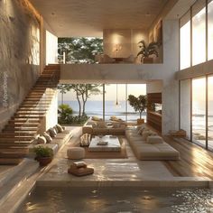 a living room filled with lots of furniture next to the ocean