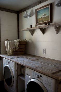 a washer and dryer in a small room