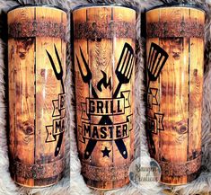 three wooden tumblers with the words grill master on them and cooking utensils