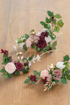 two flower crowns are sitting on a table