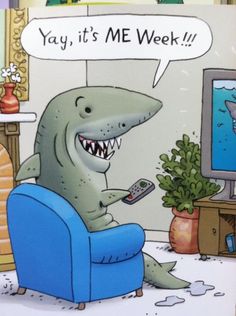 a shark sitting in a blue chair holding a remote control and looking at the tv